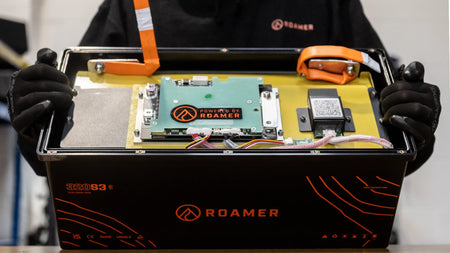 Simon from Roamer batteries opening up a SMART3 320 lithium battery in the Roamer warehouse.