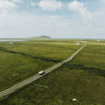 Roamer's Chewie campervan driving through rural Scotland