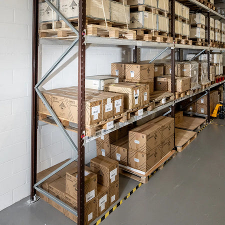 Roamer batteries stacked on shelves in  the Roamer warehouse in Leeds